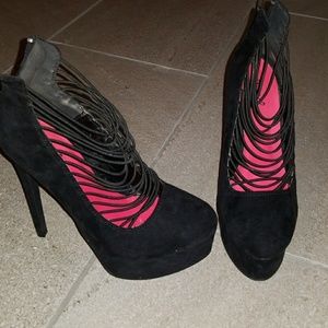 Rear zip front strap heels